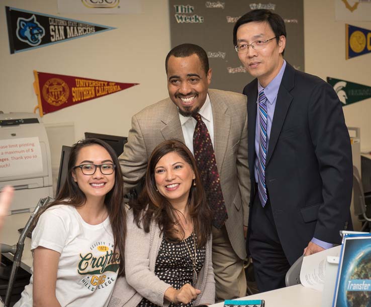 Signing an agreement for the Pathways Promise Partnership