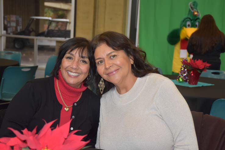 People enjoying the Holiday Party