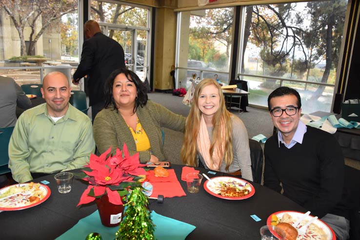 People enjoying the Holiday Party