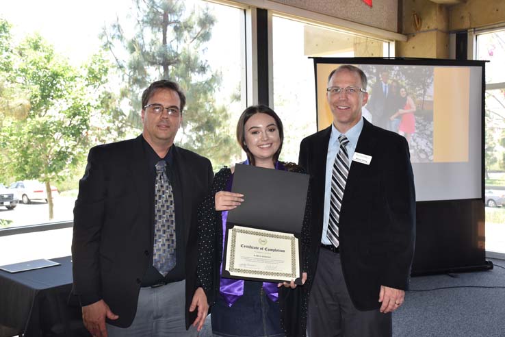 CHC Honors Institute graduates showcase their academic achievements.