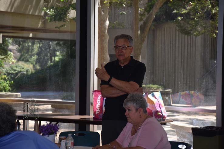 People enjoying the retiree brunch and campus tour