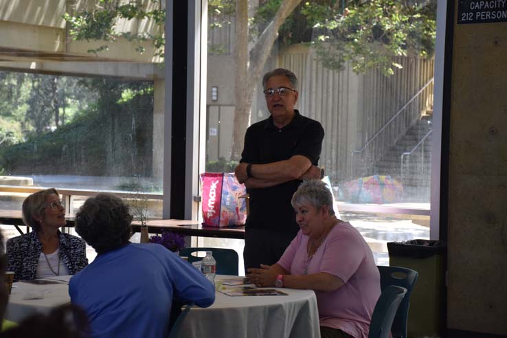 People enjoying the retiree brunch and campus tour