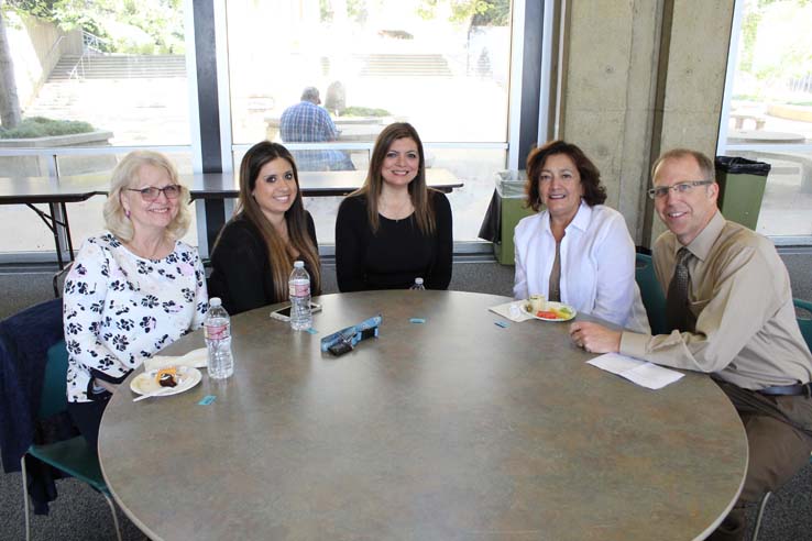 Faculty and staff celebrate the Employee Appreciation & Recognition Reception.