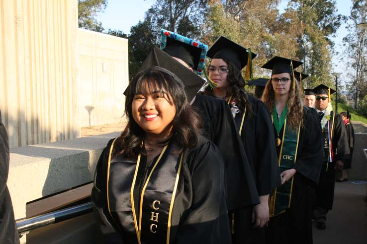 Students on walkway at Commencement