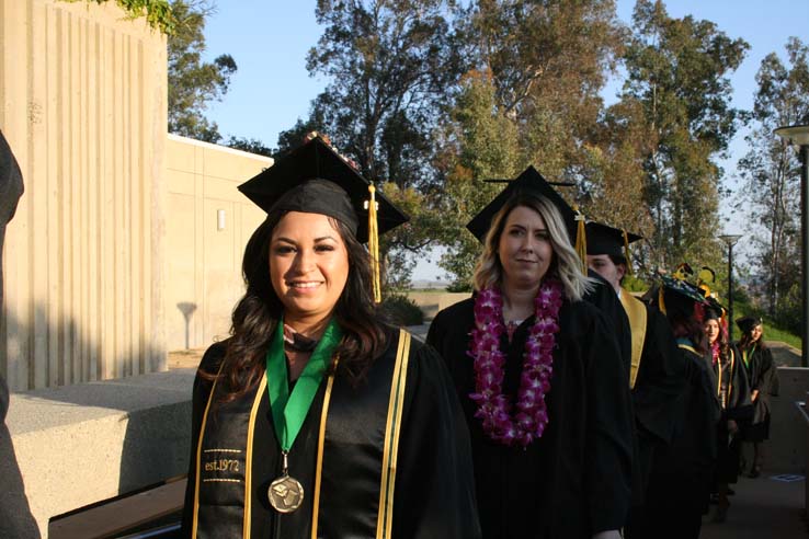 Students on walkway at Commencement