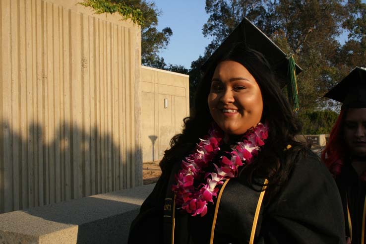 Students on walkway at Commencement