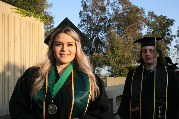 Students on walkway at Commencement