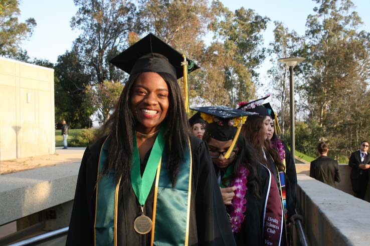 Students on walkway at Commencement