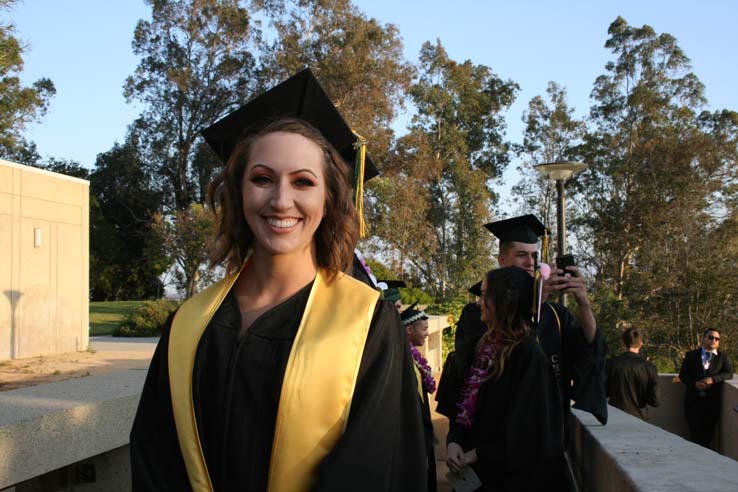 Students on walkway at Commencement