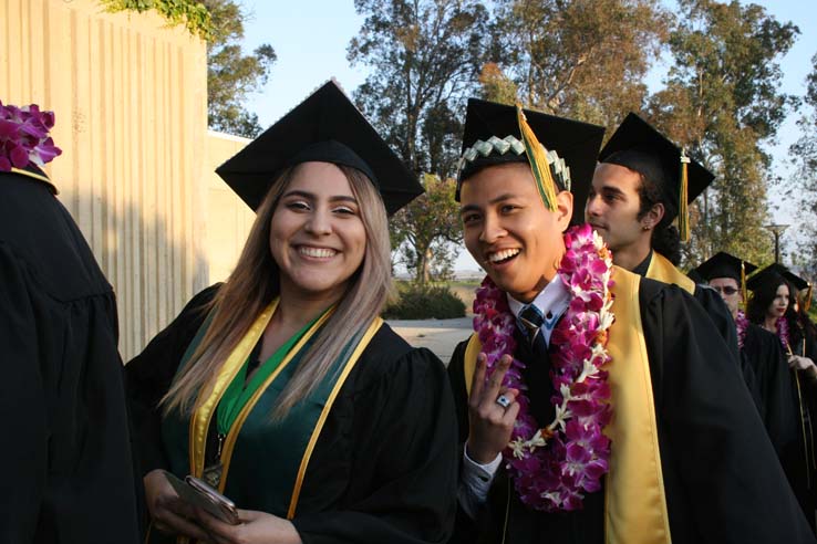 Students on walkway at Commencement