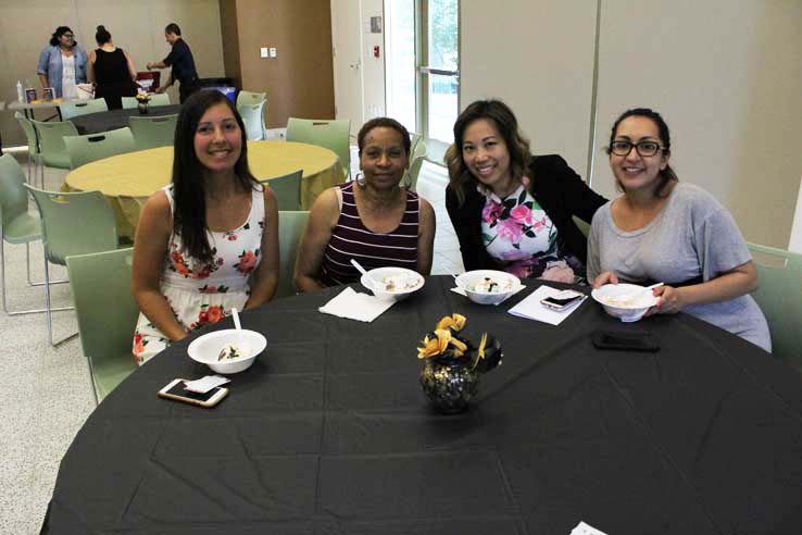 Staff practicing belly dancing