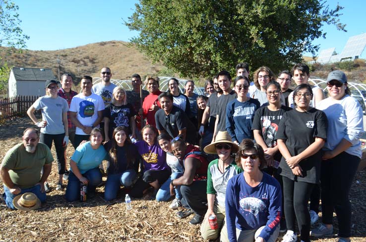 People working in the community garden