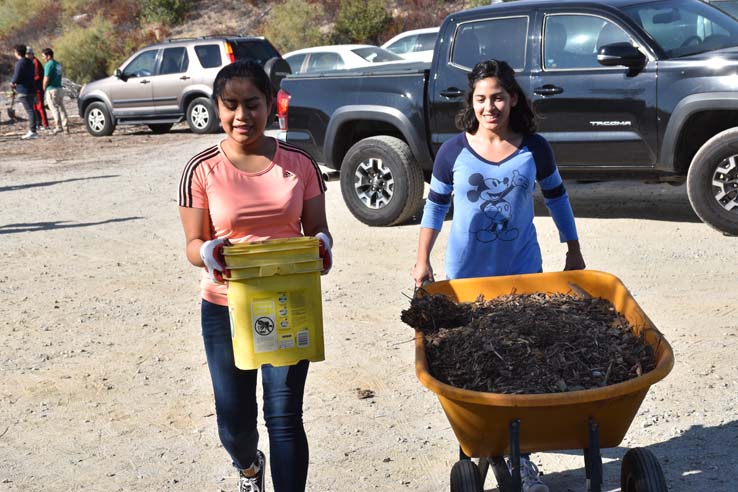 People working in the community garden