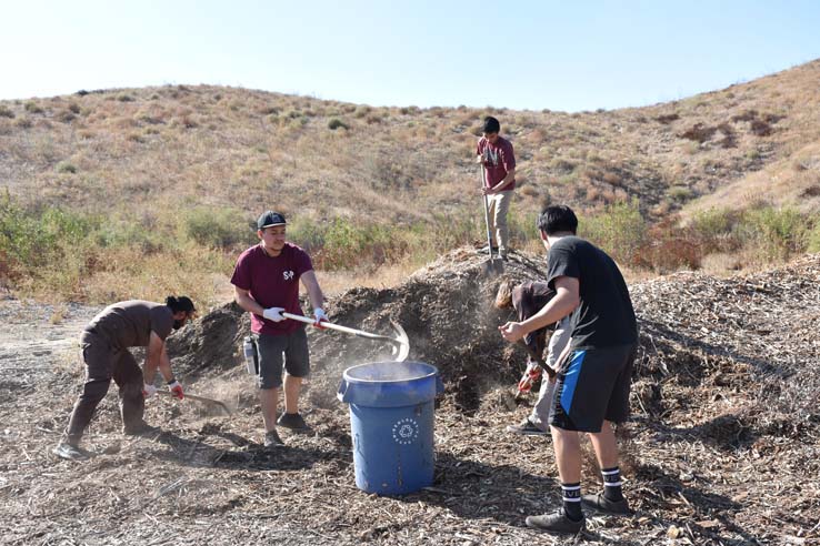 People working in the community garden