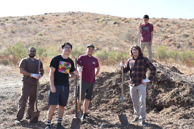 People working in the community garden