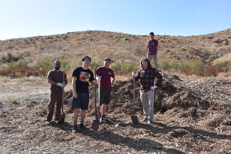 People working in the community garden