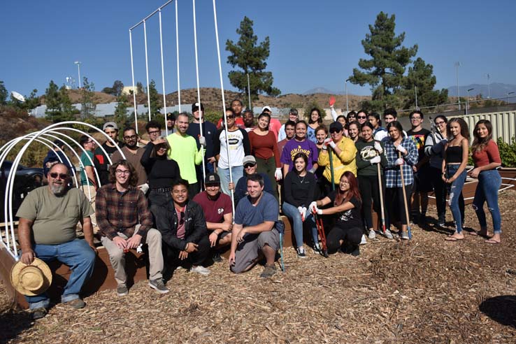 People working in the community garden