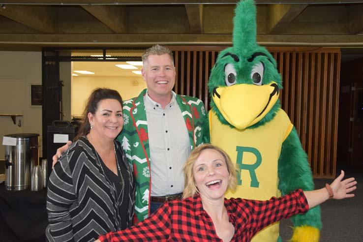 People enjoying the holiday reception