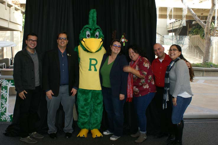 People enjoying the holiday reception