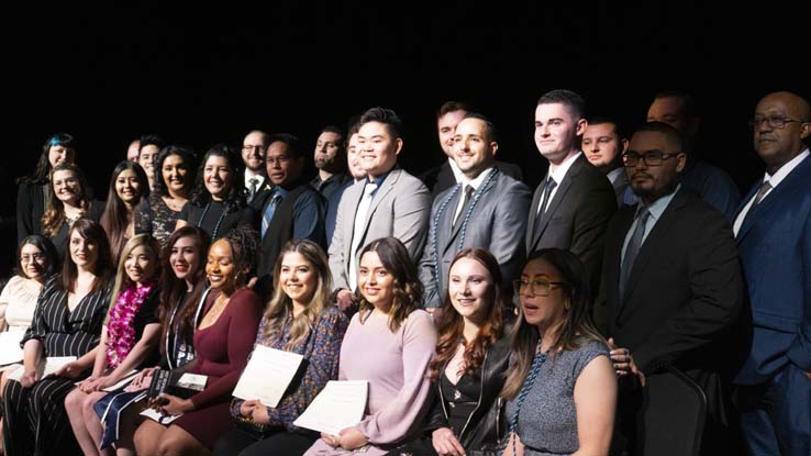 People celebrating the Respiratory Care Graduation.