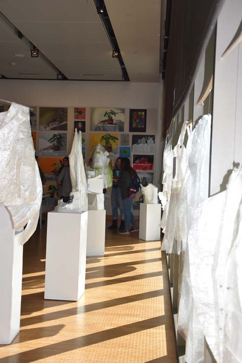 People enjoying the Student Art Exhibit