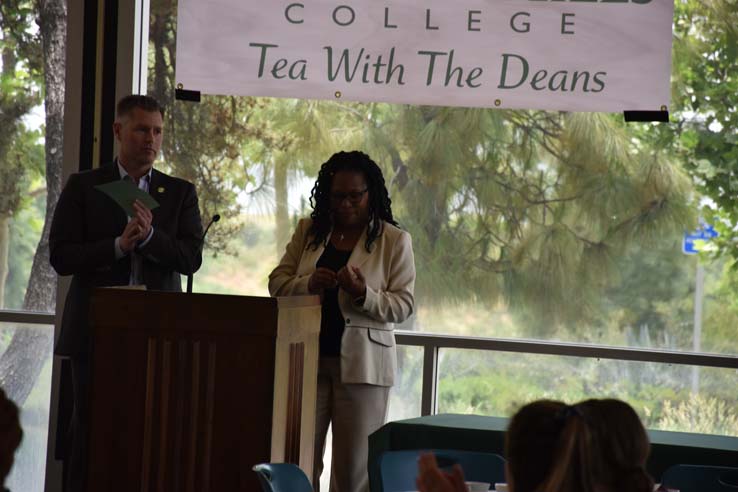 People enjoying Tea With the Deans