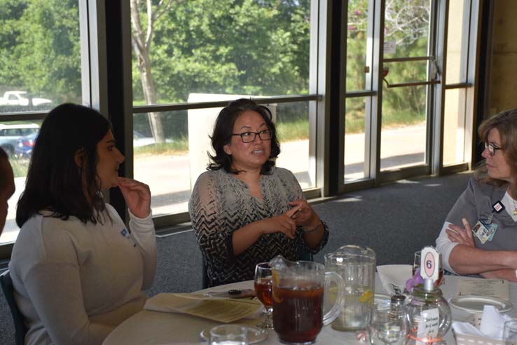 People enjoying the Etiquette Luncheon