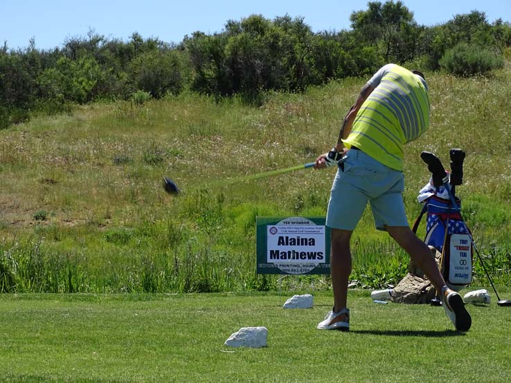 People enjoying the Fire Academy Golf Tournament