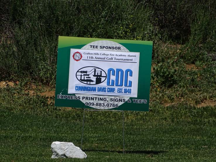 People enjoying the Fire Academy Golf Tournament