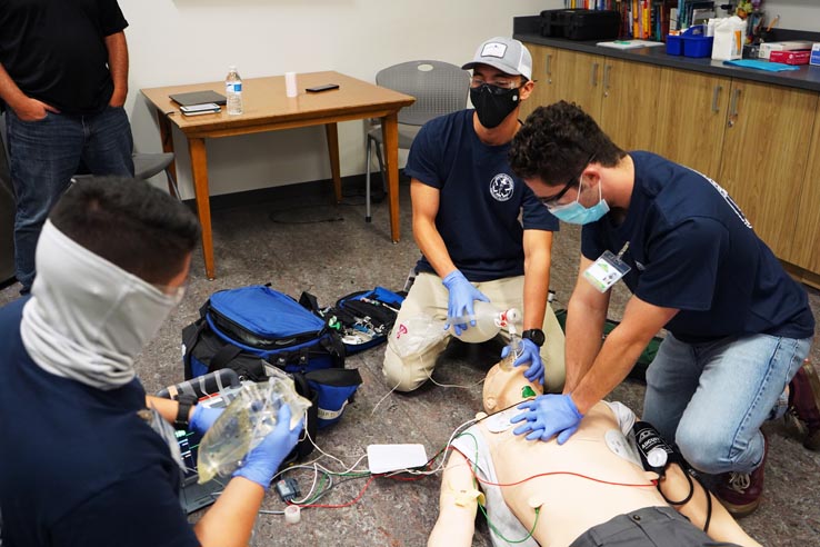 Paramedic students at education expo