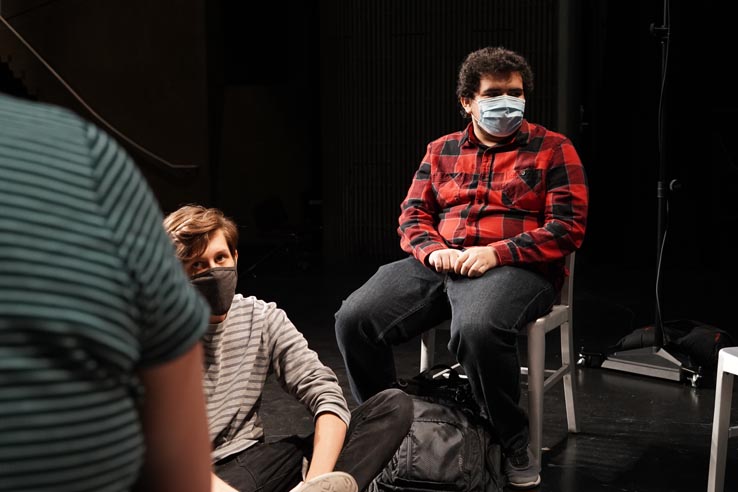 Theatre students wearing protective masks