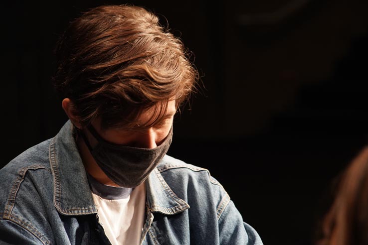 Theatre students wearing protective masks