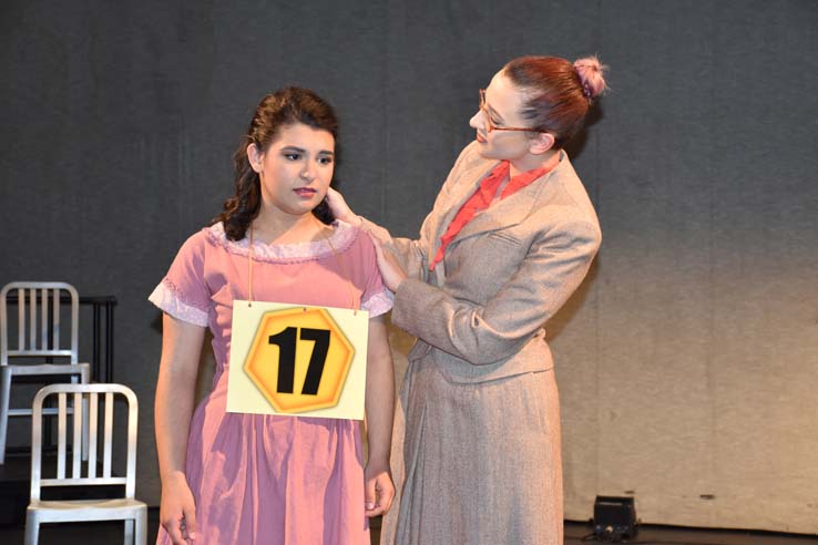 Performers in the production