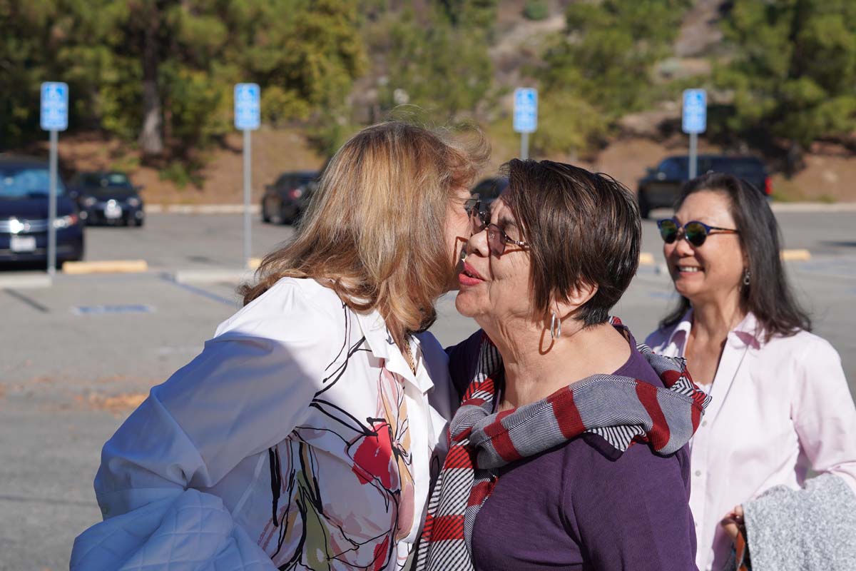 People enjoying the Friends Annual Luncheon