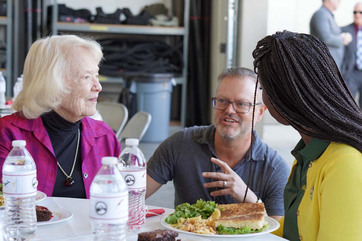 People enjoying the Friends Annual Luncheon