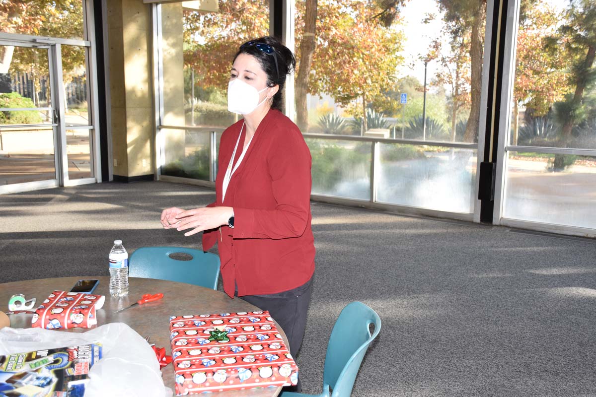 People enjoying the holiday party.