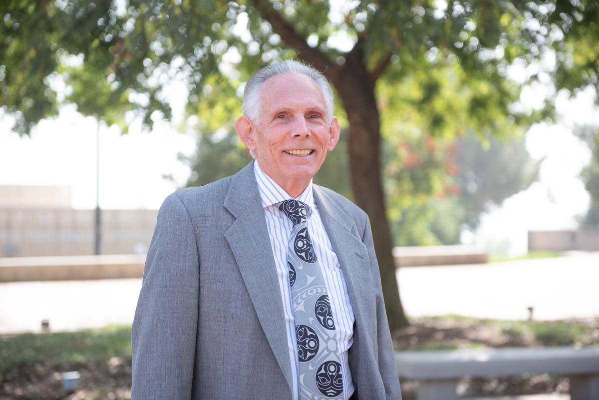 People enjoying the Legacy Wall unveiling