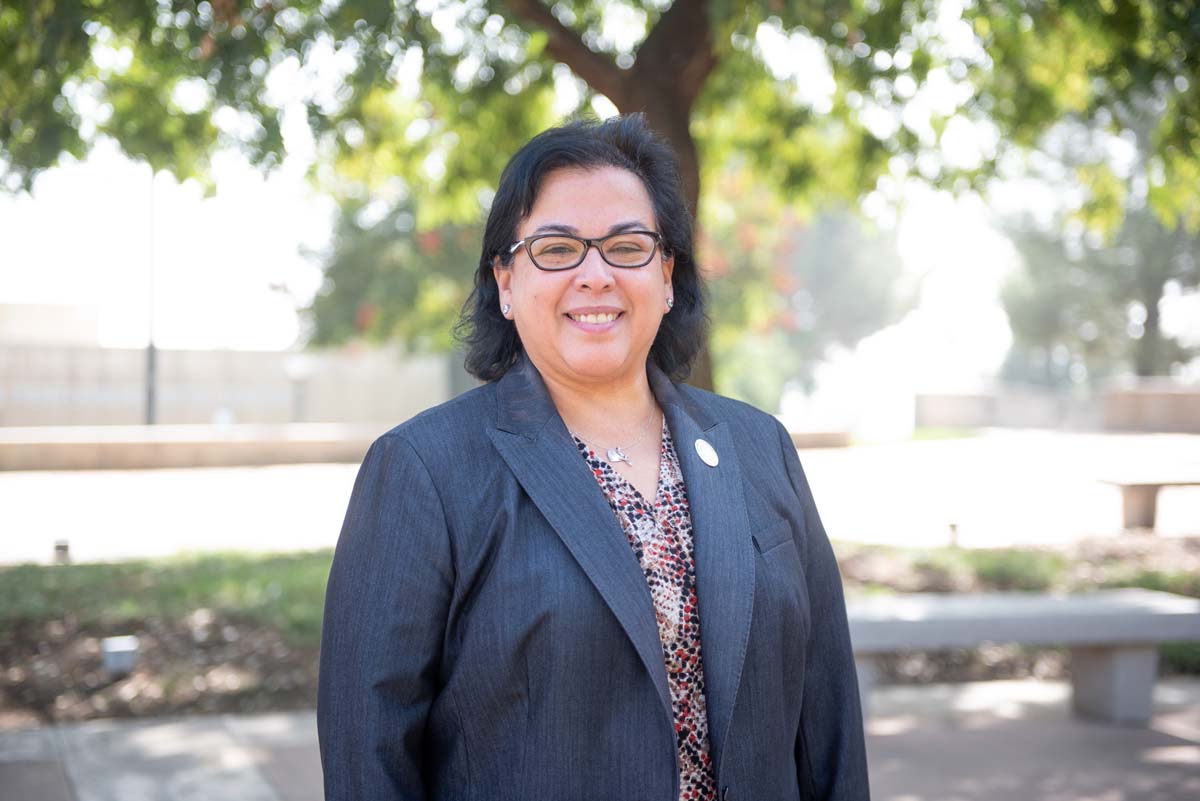 People enjoying the Legacy Wall unveiling