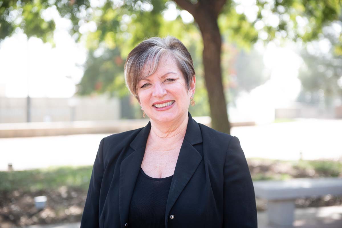 People enjoying the Legacy Wall unveiling