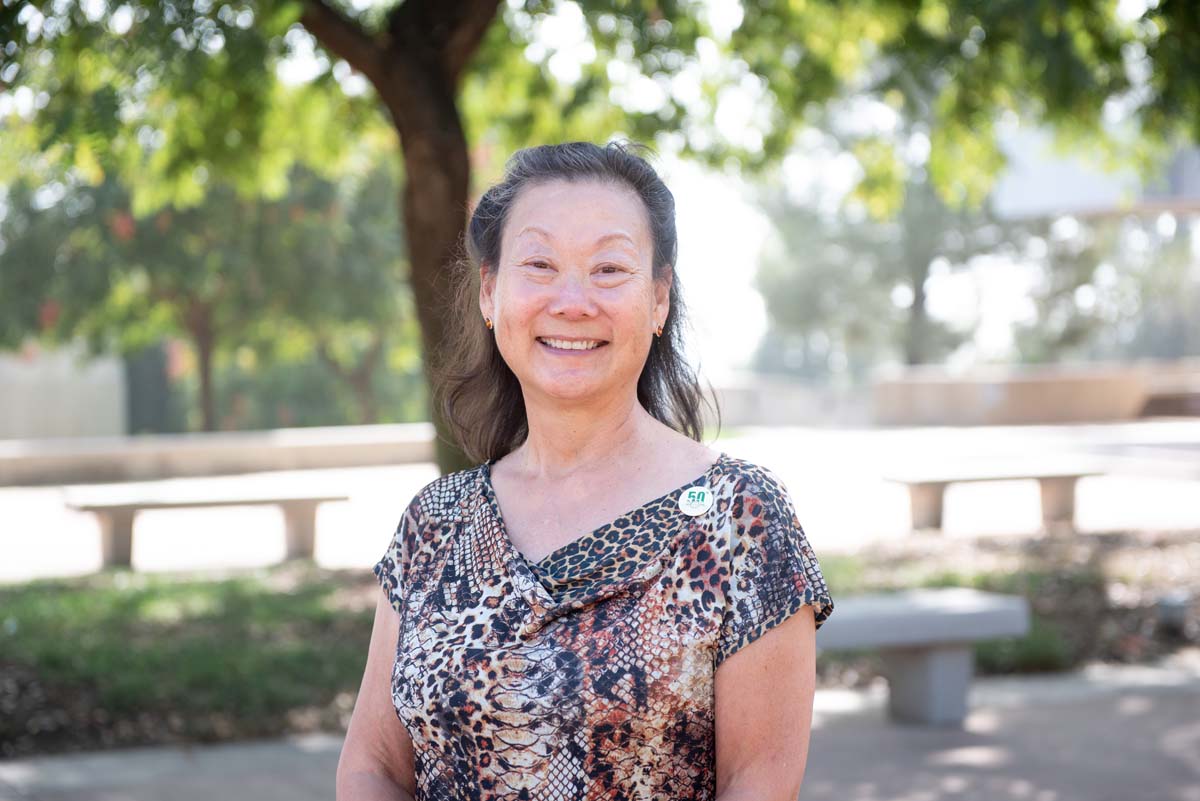 People enjoying the Legacy Wall unveiling