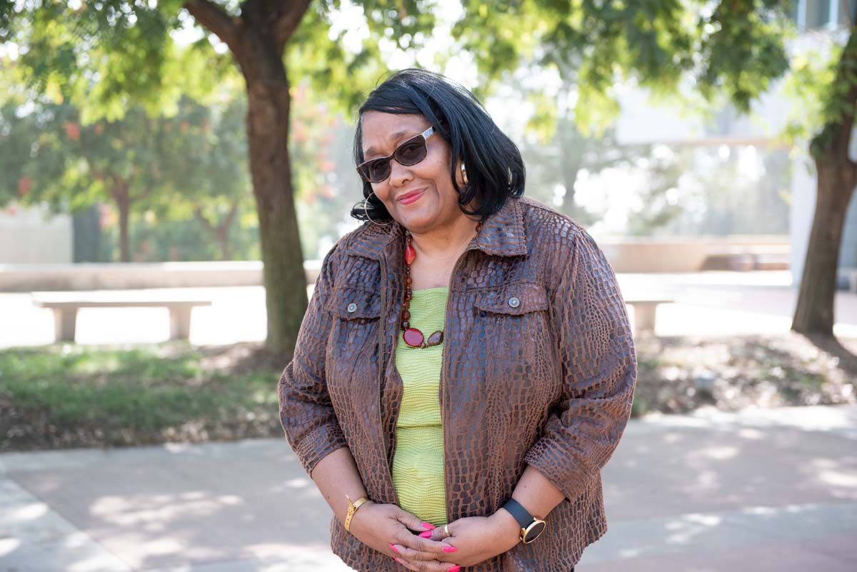 People enjoying the Legacy Wall unveiling