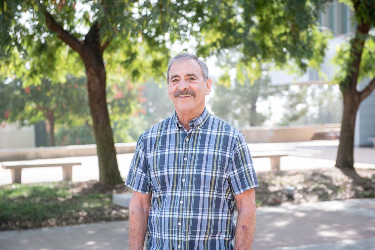 People enjoying the Legacy Wall unveiling