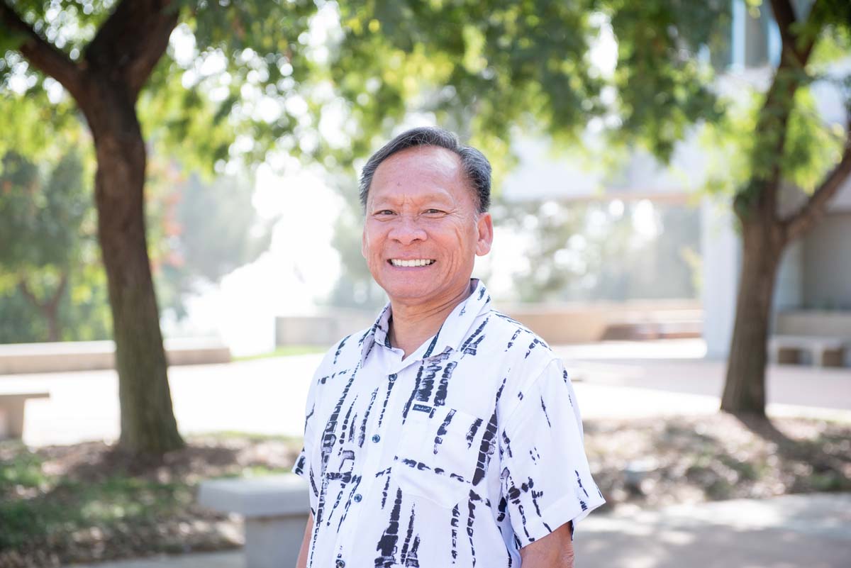 People enjoying the Legacy Wall unveiling