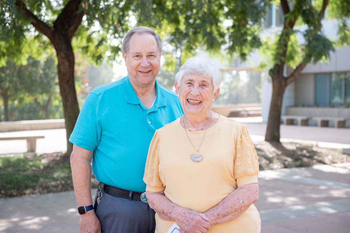 People enjoying the Legacy Wall unveiling