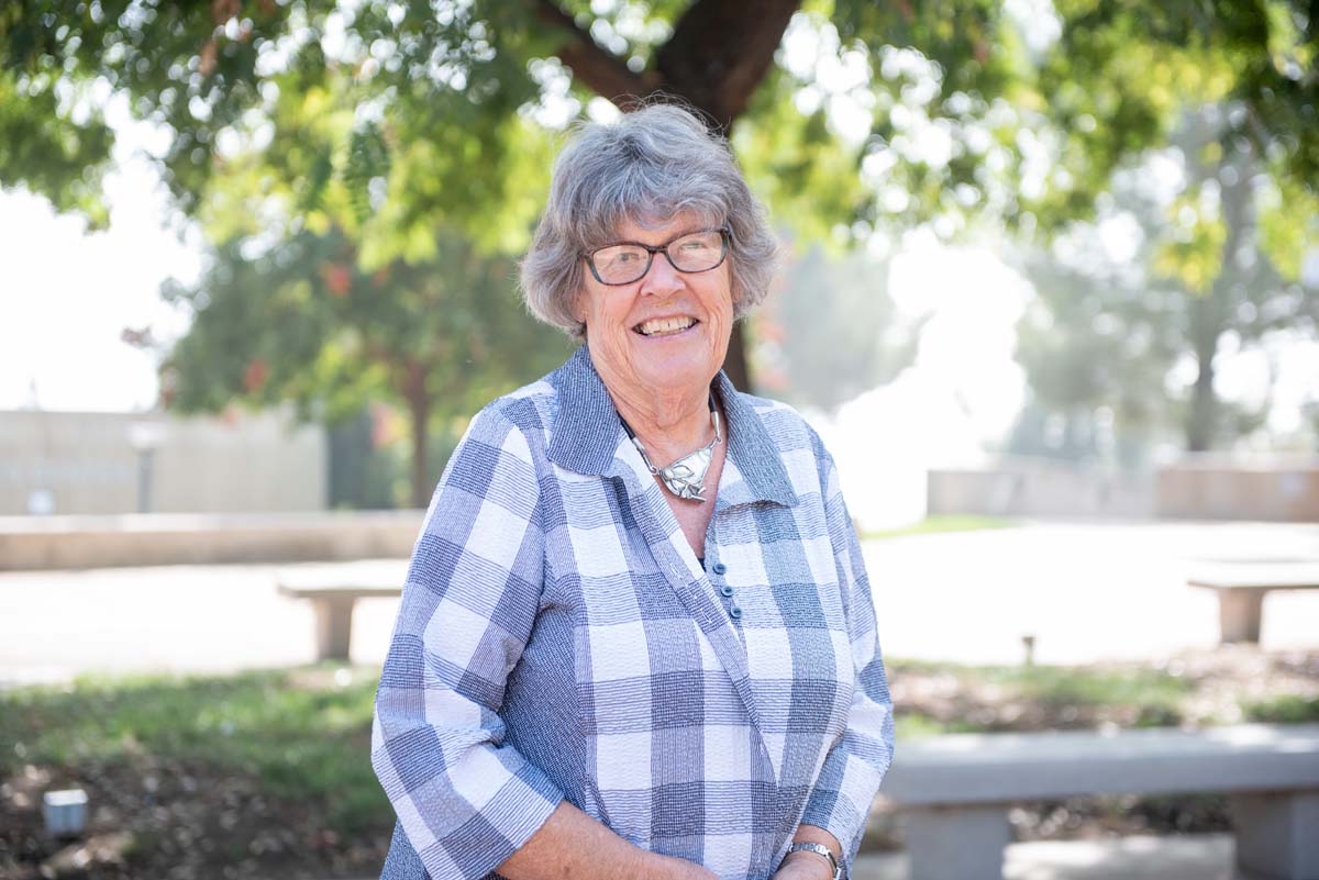 People enjoying the Legacy Wall unveiling