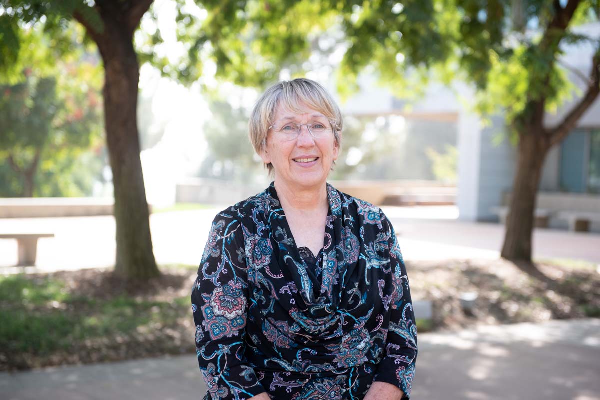 People enjoying the Legacy Wall unveiling