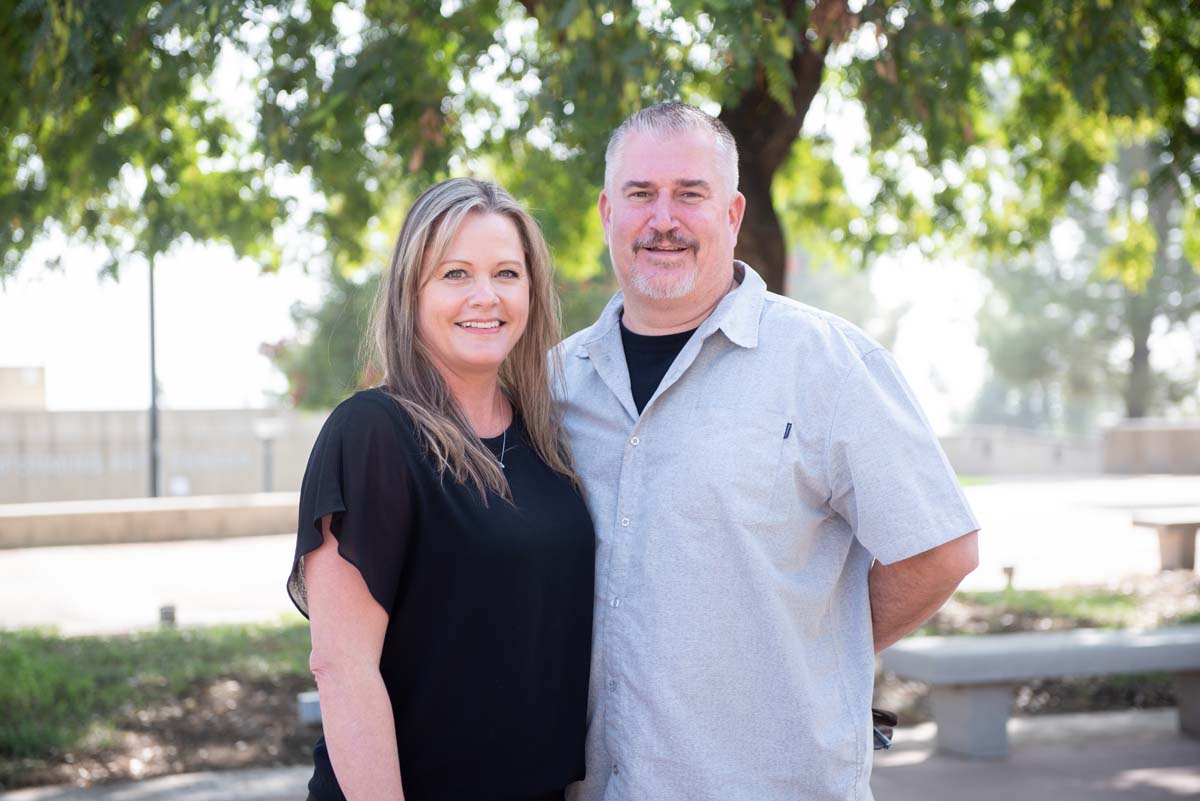 People enjoying the Legacy Wall unveiling