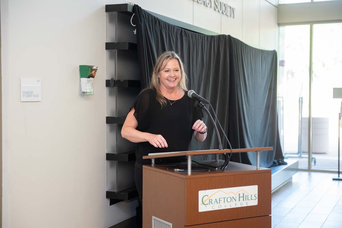 People enjoying the Legacy Wall unveiling