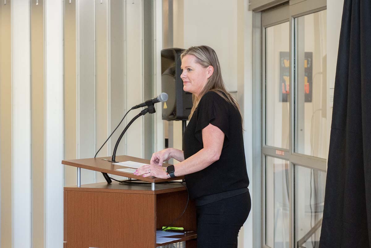 People enjoying the Legacy Wall unveiling