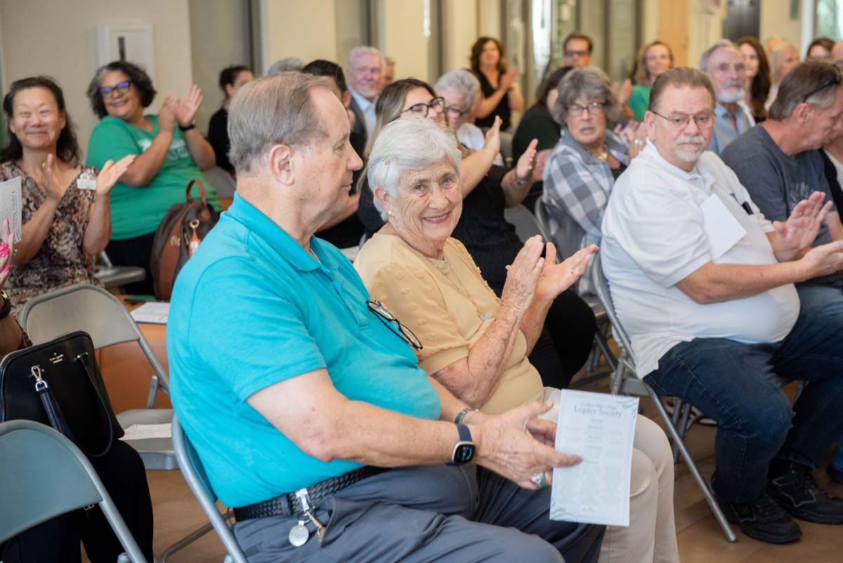 People enjoying the Legacy Wall unveiling